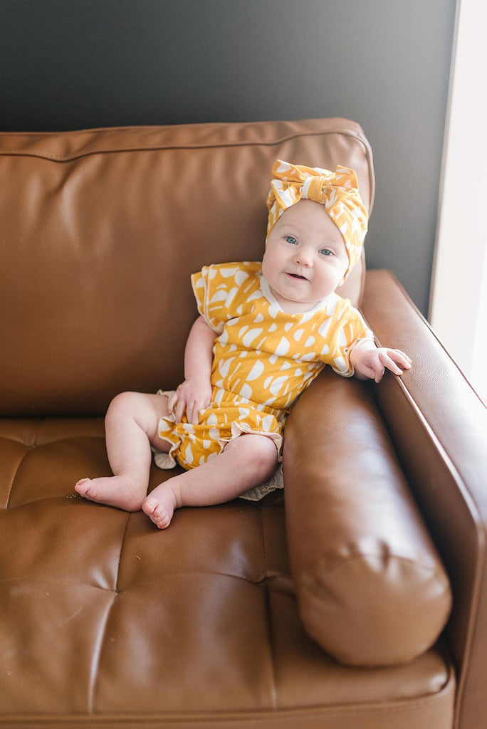 earth baby outfitter neutral luna ruffle set